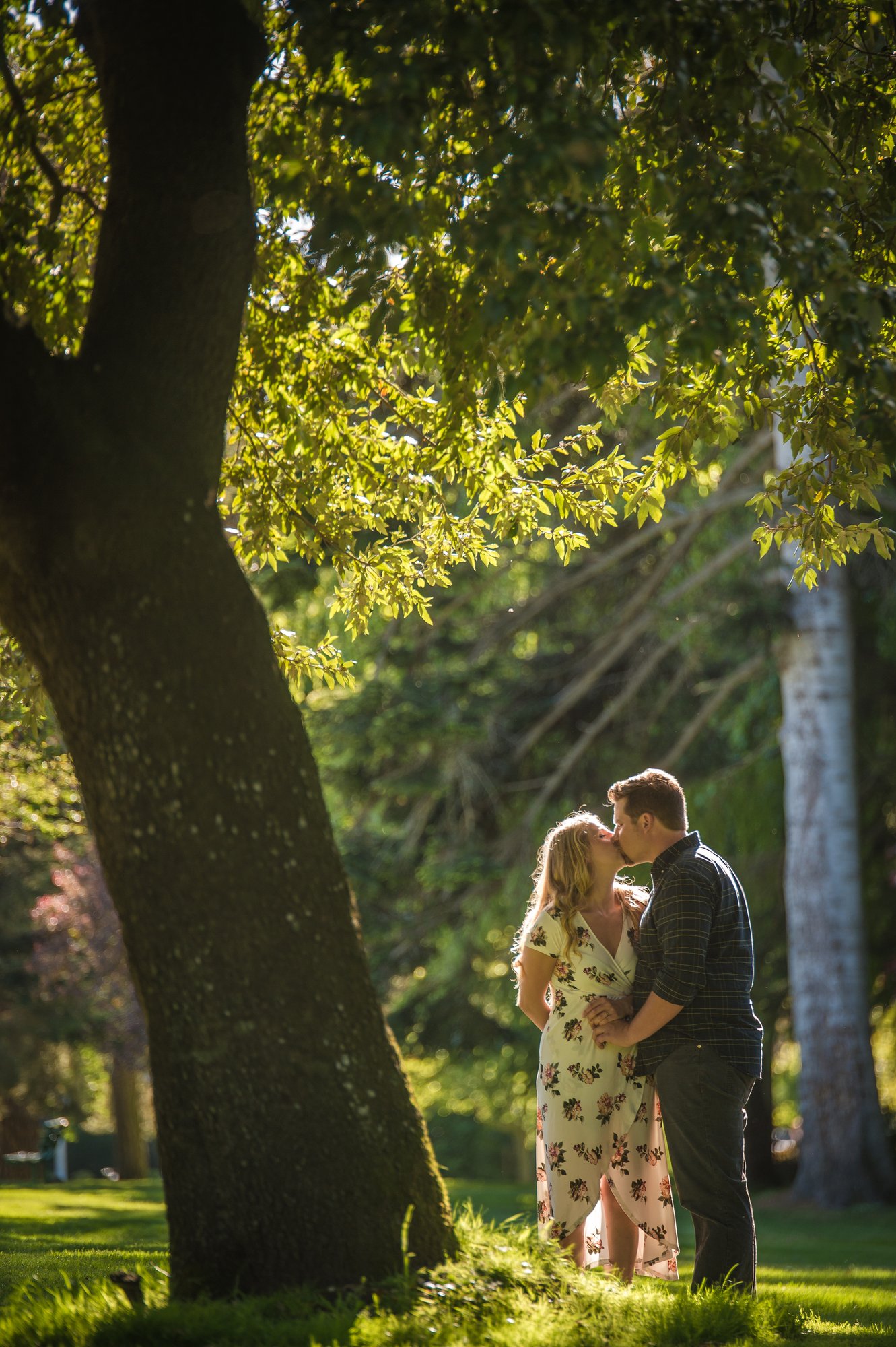 Alik and Amanda together during their engagement session at Beacon Hill Park in Victoria