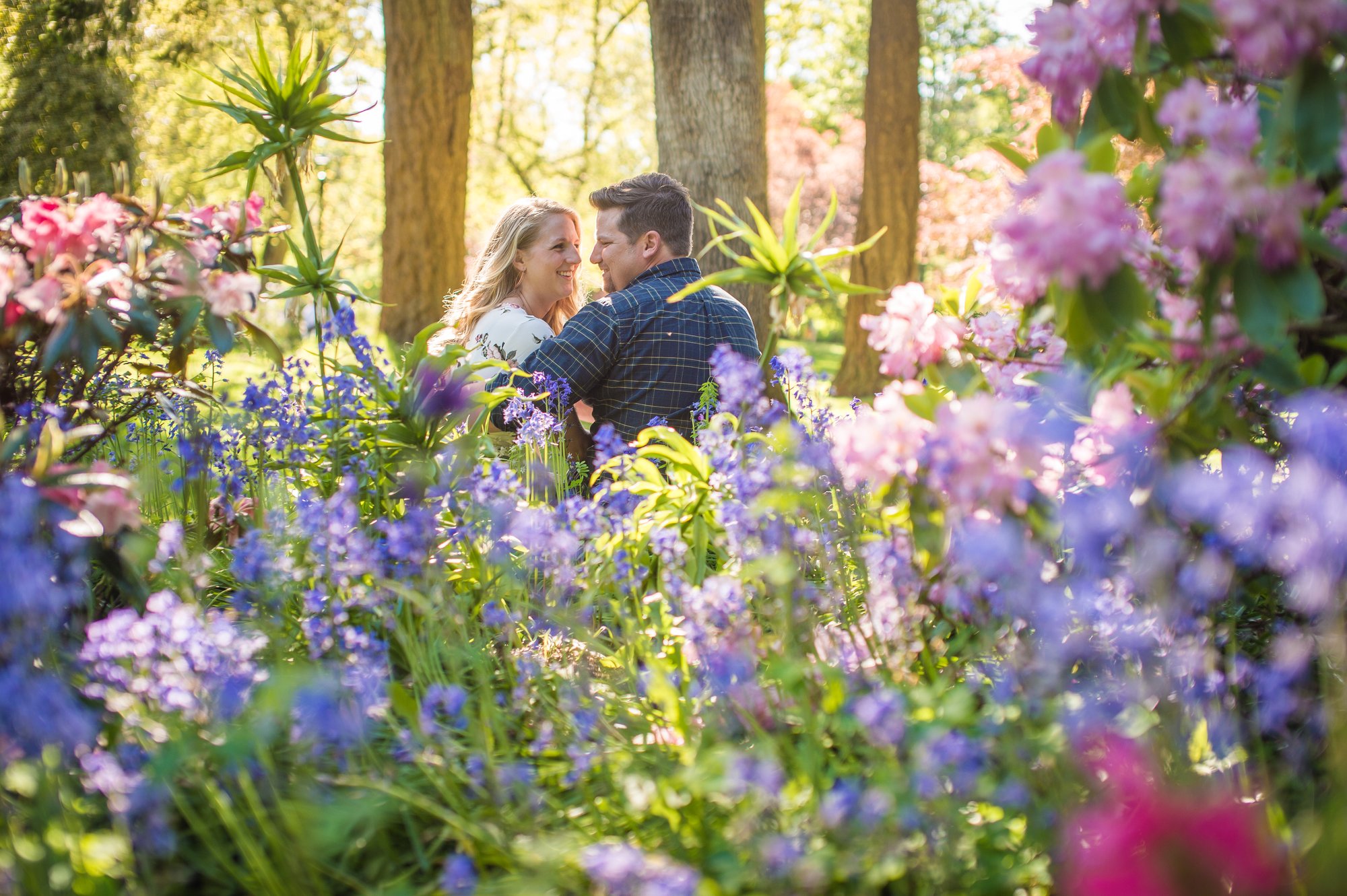 Alik and Amanda together during their engagement session at Beacon Hill Park in Victoria