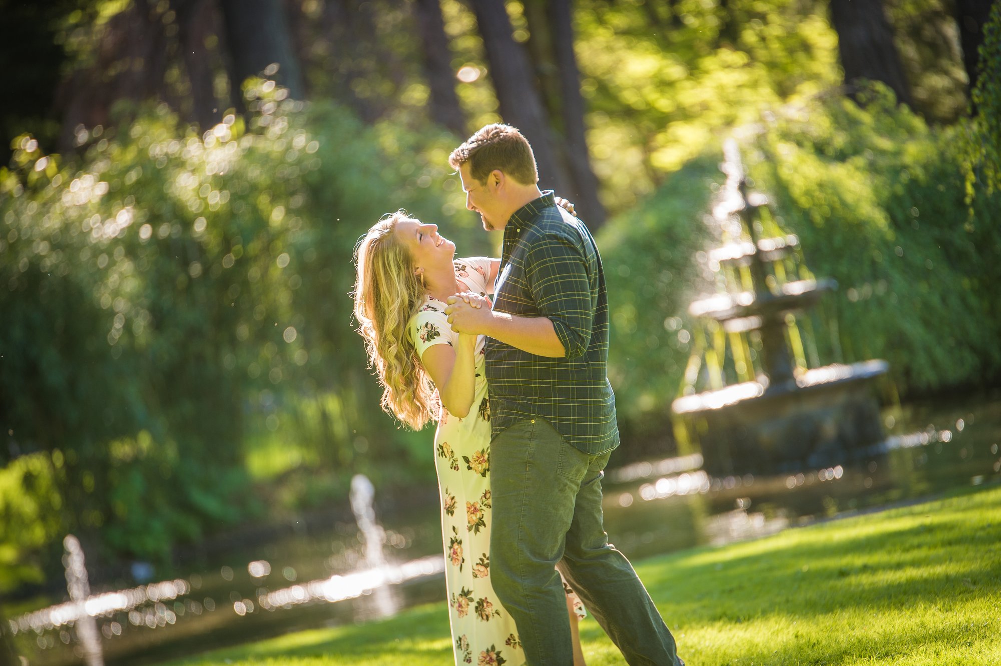 Alik and Amanda together during their engagement session at Beacon Hill Park in Victoria