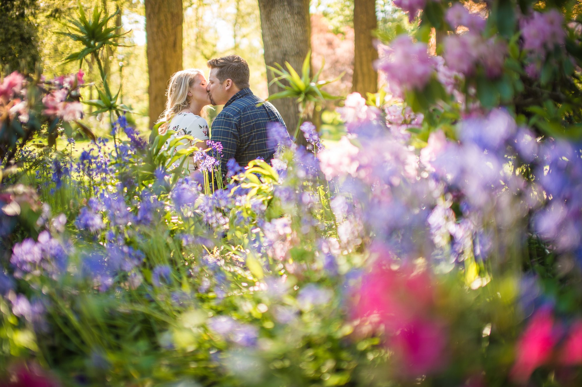 Alik and Amanda together during their engagement session at Beacon Hill Park in Victoria