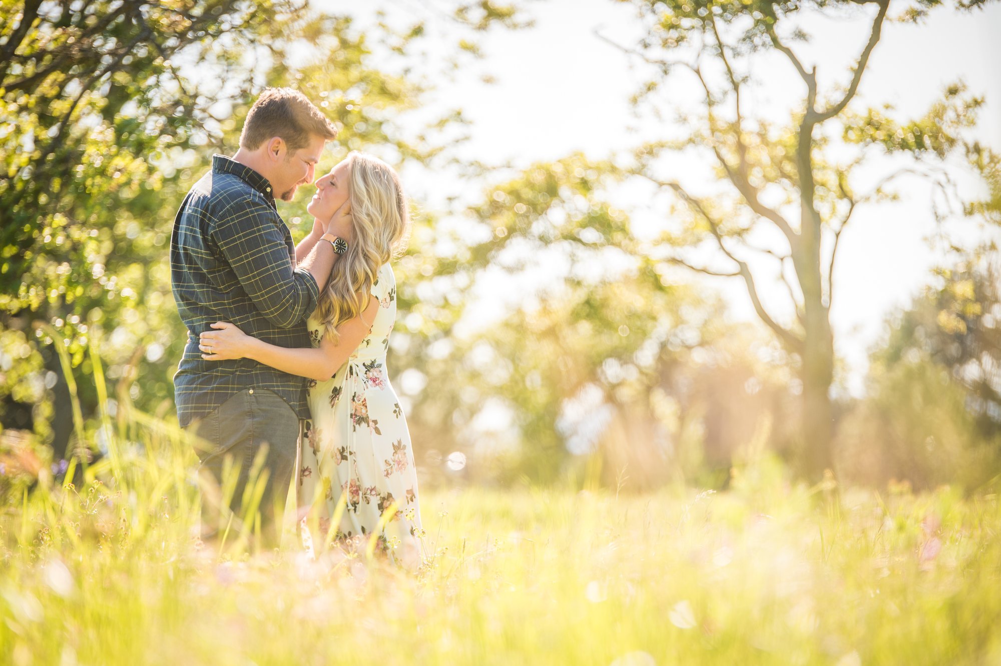 Alik and Amanda together during their engagement session at Beacon Hill Park in Victoria