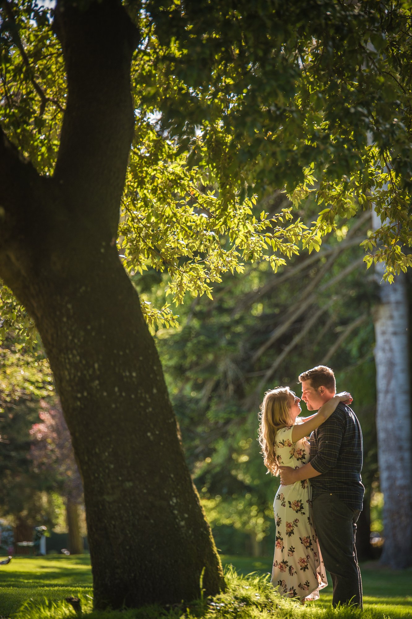 Alik and Amanda together during their engagement session at Beacon Hill Park in Victoria