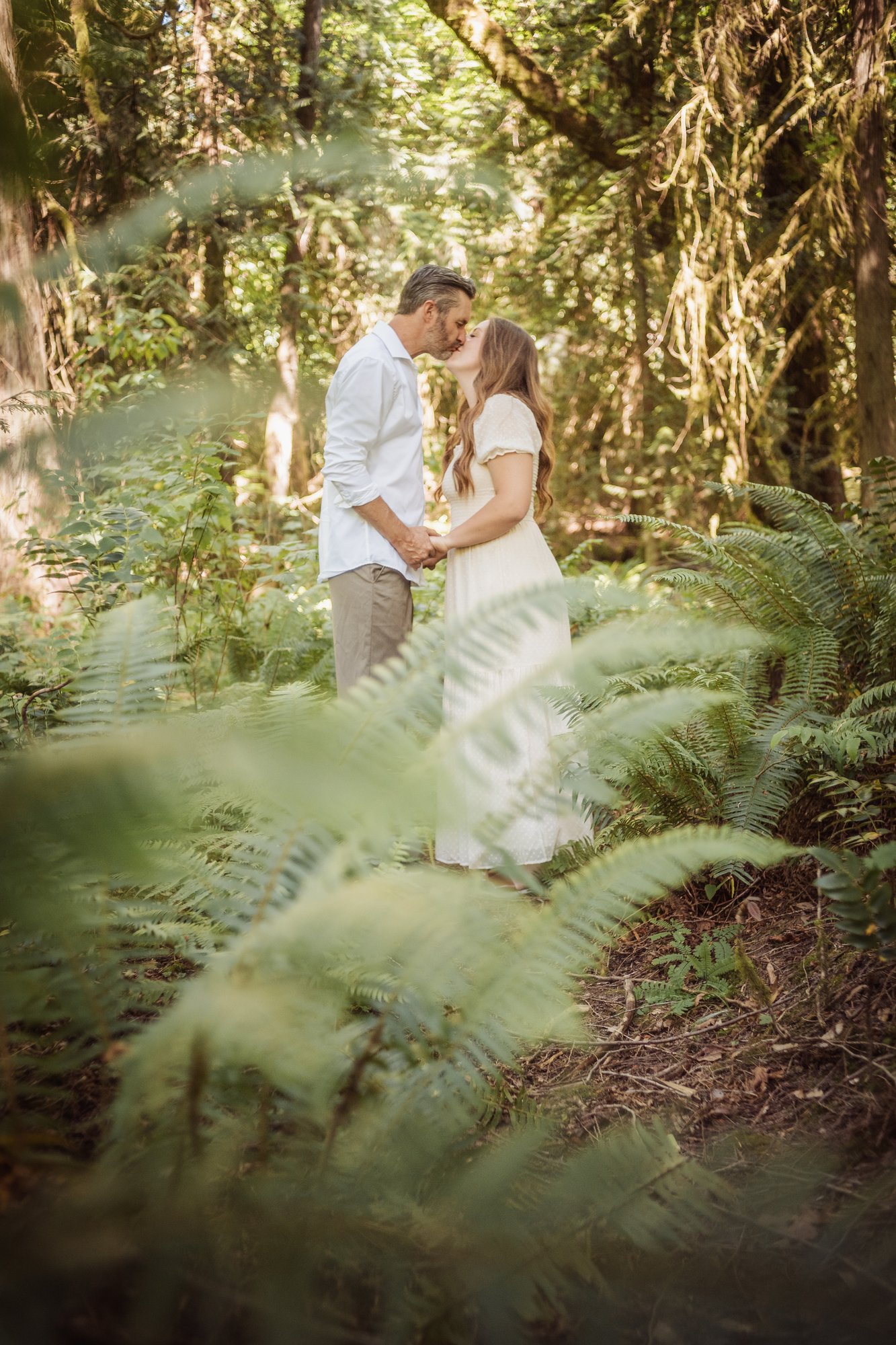 Mikaila and Geordie together among the trees at Bright Angel Regional Park