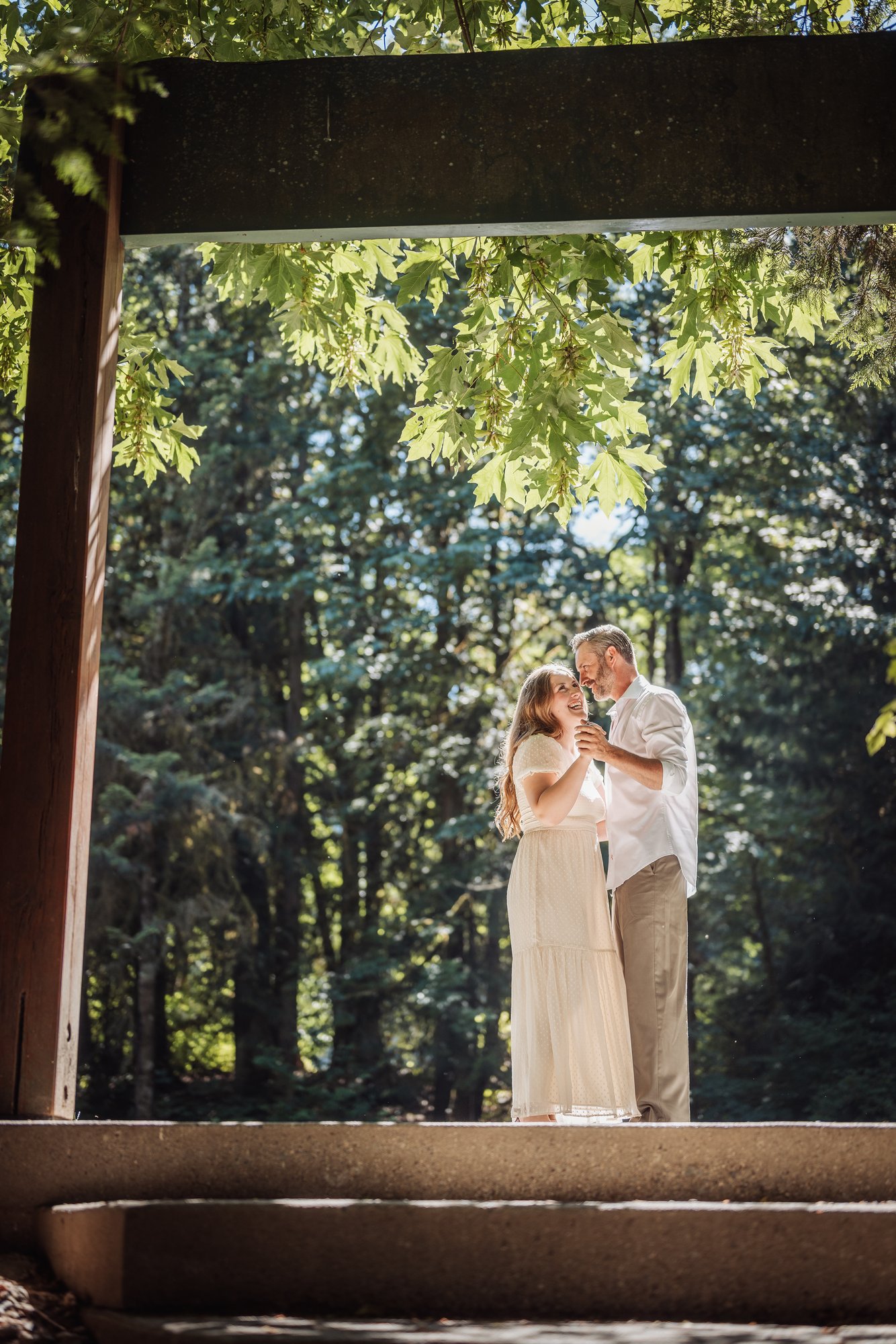 Mikaila and Geordie together among the trees at Bright Angel Regional Park